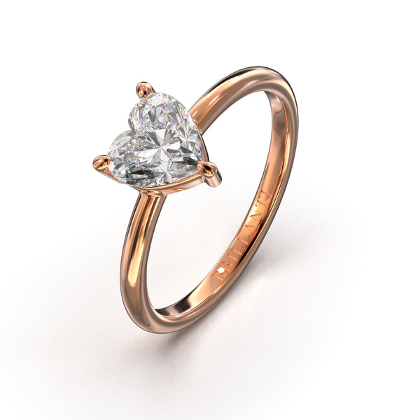 Verlobungsring mit herzförmigem Diamantschliff und Roségoldring