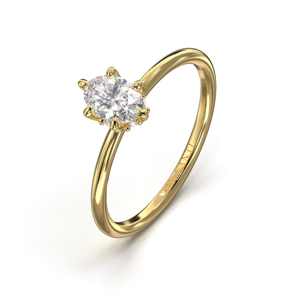 Verlobungsring in Gold mit majestätischer Krone und ovalem Diamantschliff
